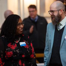 Councilor Latatious Morris and Assistant Manager Dustin Tripp chatting at the 2026 Knightdale State of the Town