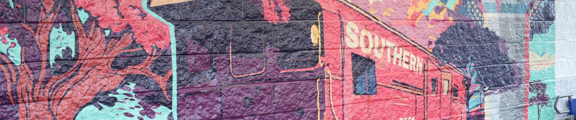 Mural of a red caboose.