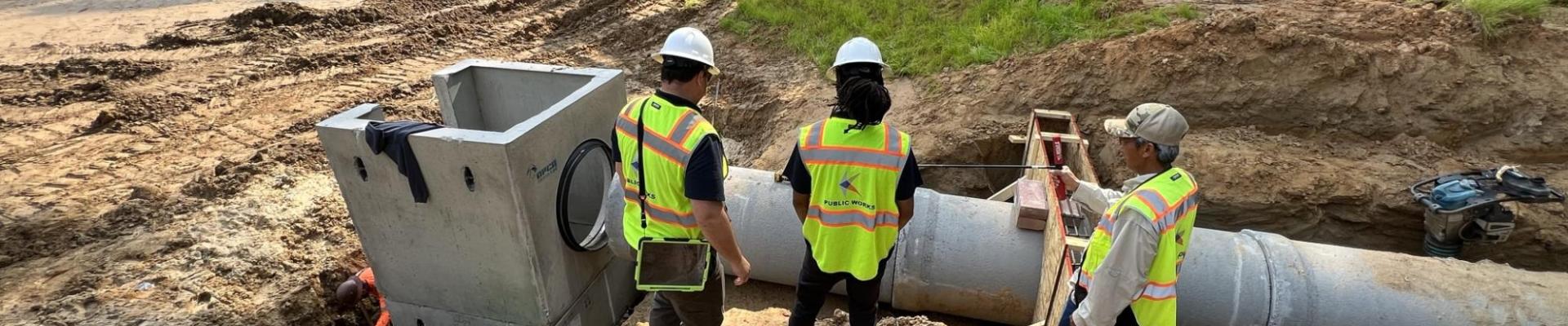 Knightdale Inspectors looking at Stormwater Device Installation 