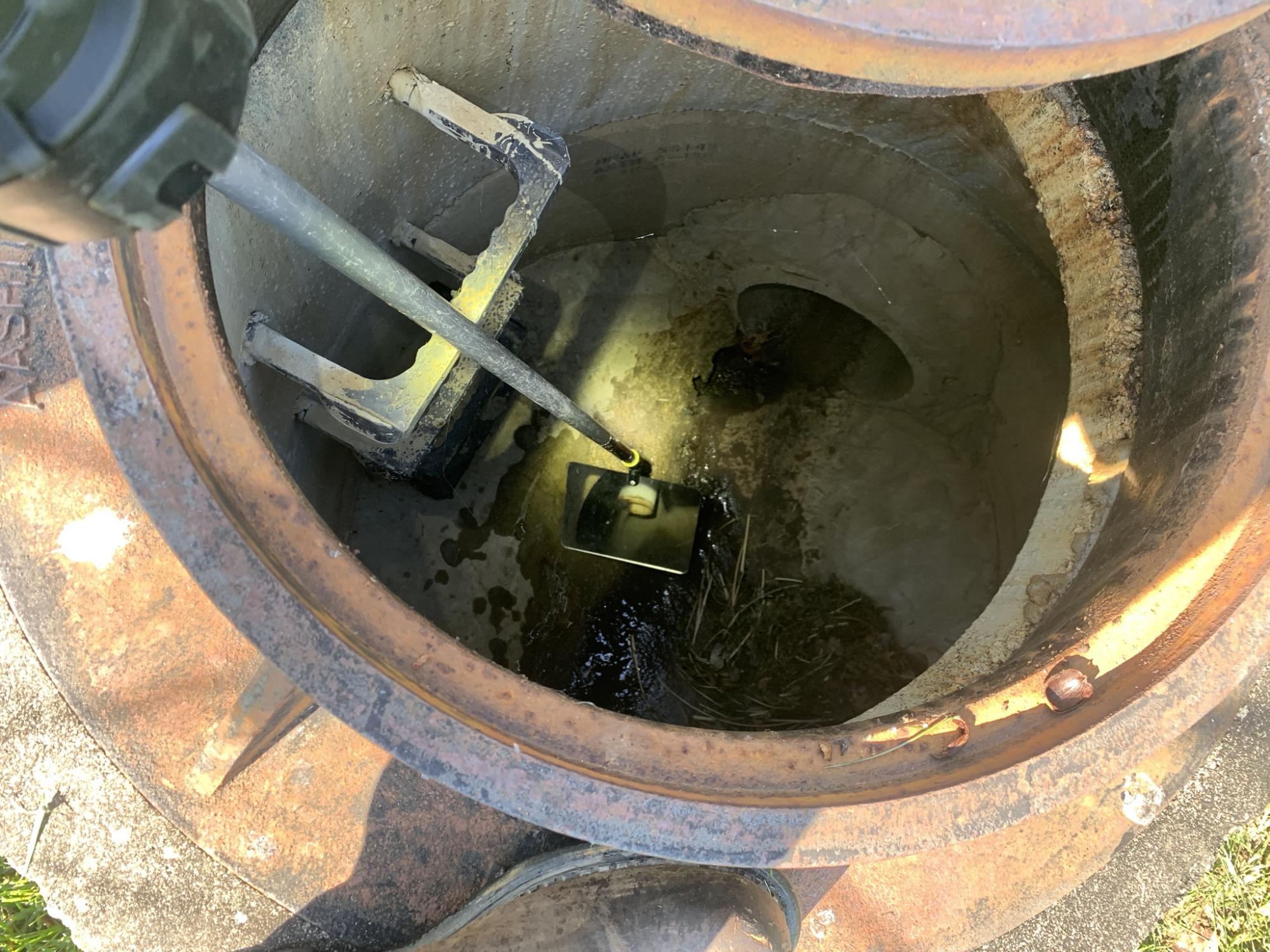 Illicit pipe connection within stormwater conveyance 