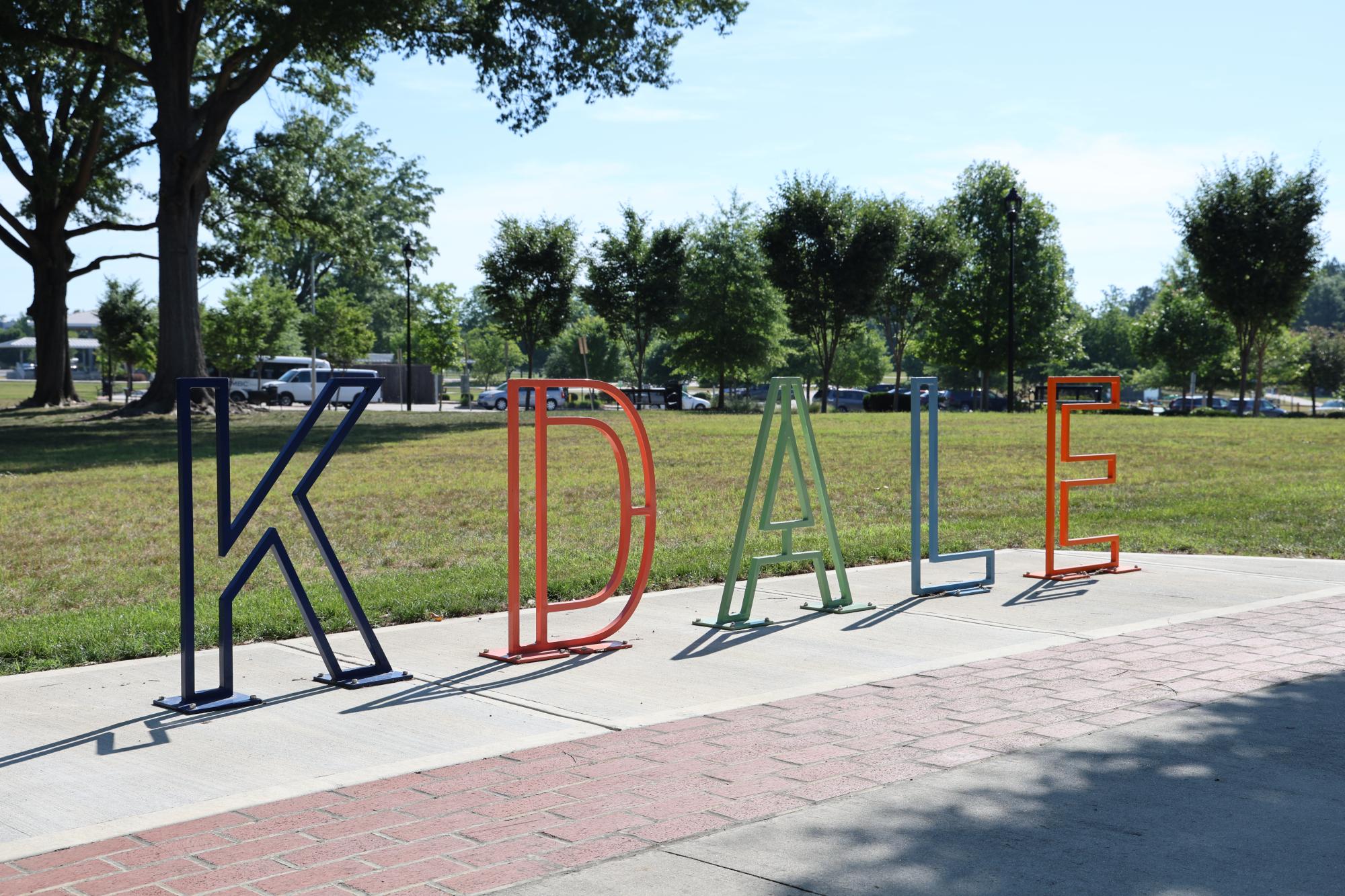 Bike rack with letters that spell KDALE