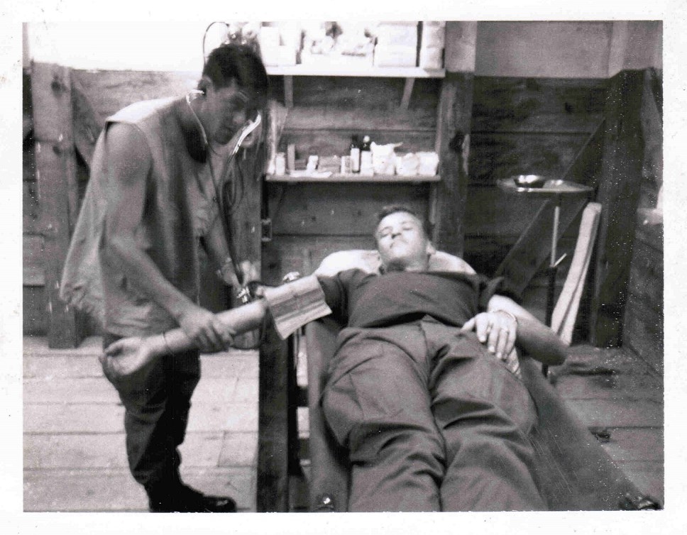 Military personnel conducting medical training